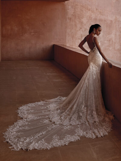 Mermaid sparkle lace wedding dress with V-neck and scalloped train, by Pronovias Bridal Shop North Yorkshire
