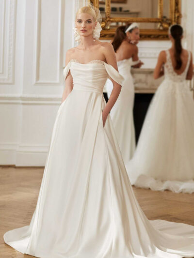 Satin ballgown with pleated bodice and peekaboo beaded cups and detachable straps Bridal Shop Northallerton