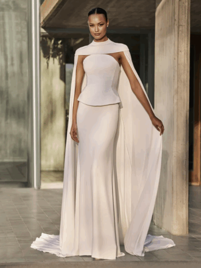 Strapless column bridal wedding dress in crepe with bridal cape by Pronovias Bridal Shop North Yorkshire