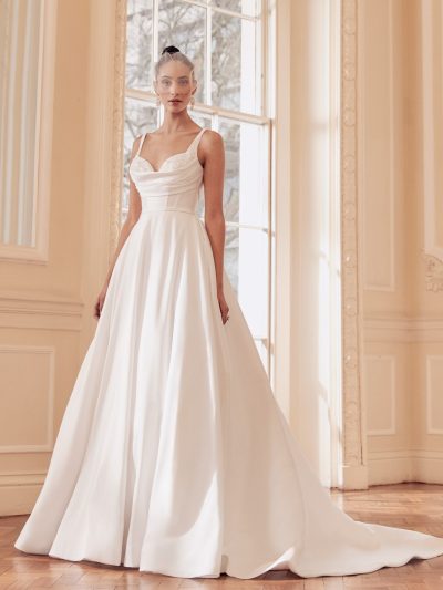 A satin ballgown with corset bodice, and pearl cups, by Ellis Bridals. Bridal Shop Northallerton