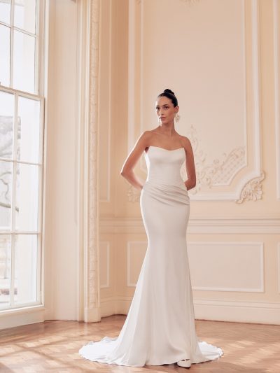 Corset bodice fit and flare wedding dress with ruched detail and cat eye neckline, by Ellis.  Bridal Shop Northallerton