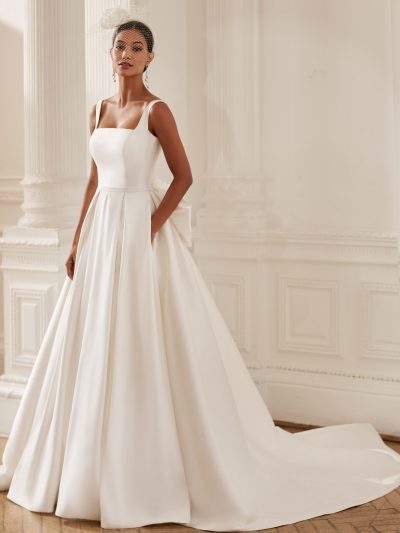 Satin ball gown with square neckline and detachable bow, by Ellis Bridal shop Northallerton
