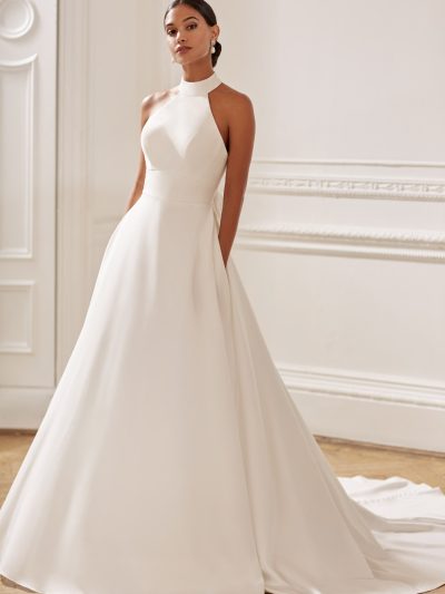 Crepe halter neck wedding dress with detachable bow, by Ellis Bridal Shop North Yorkshire