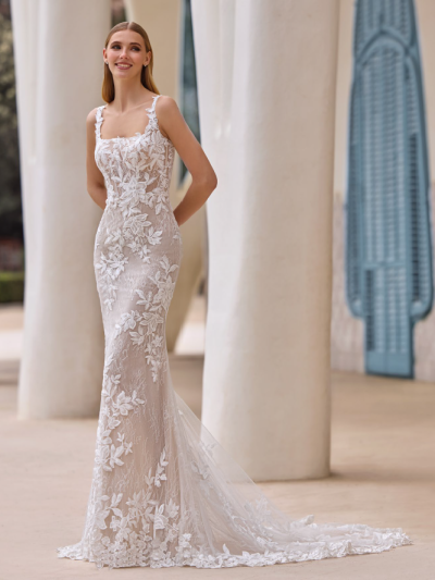 Lace mermaid dress with square neckline and floral strap, by Pronovias Bridal Shop North Yorkshire
