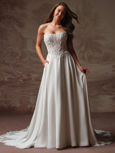 Rebecca Ingram Hazel is a delicate beaded lace bodice wedding dress with basque waist and illusion train Bridal Shop Northallerton